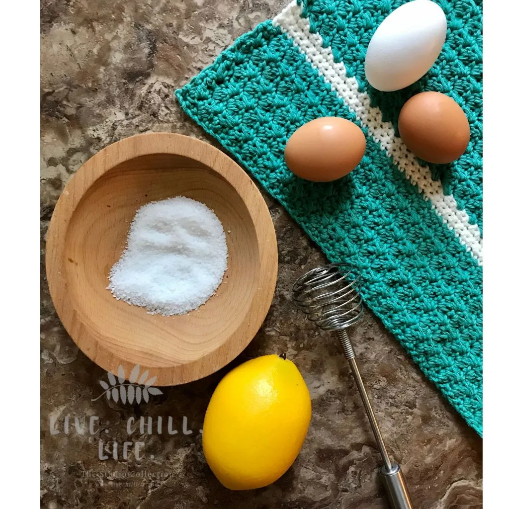 crochet dishtowel with eggs, salt bowl and lemon