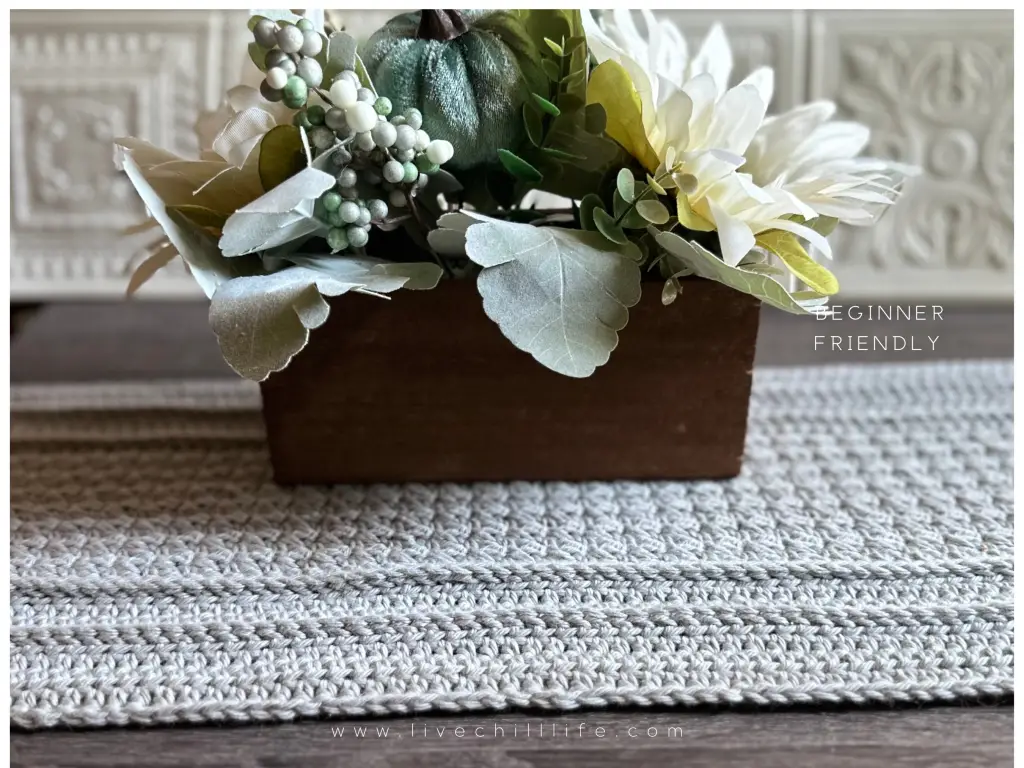 crochet table runner and centerpiece flower arrangement