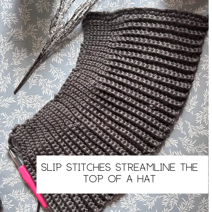 gray crochet stitches on light blue background