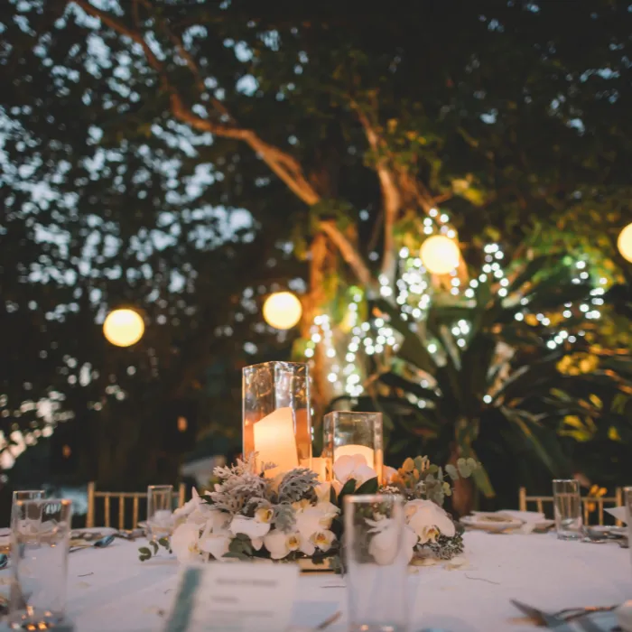 outdoor table in evening set for a wedding reception