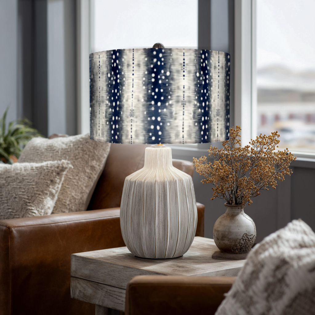 navy and beige antelope print lampshade on a small table lamp in a cozy winter living room