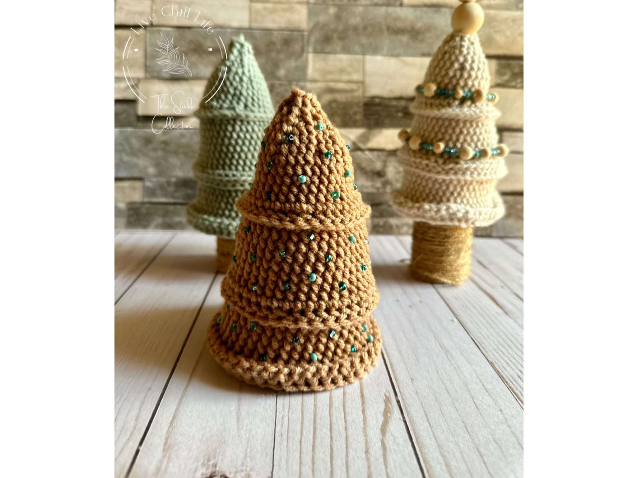 three crochet chritmas trees lined up