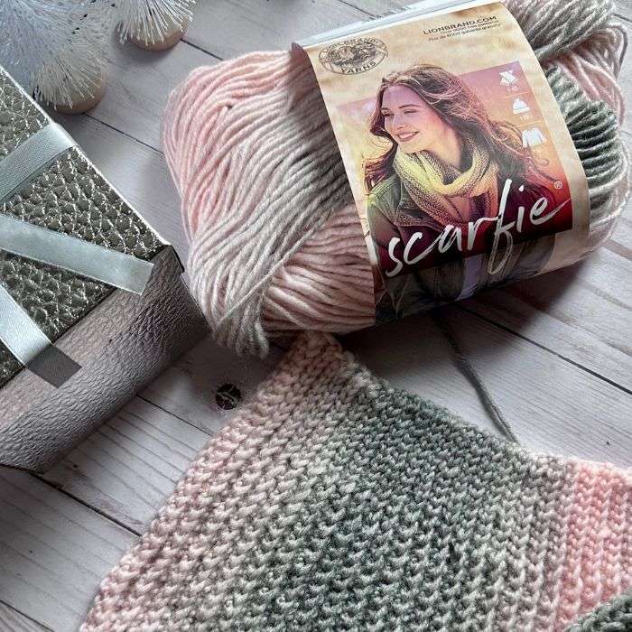 pink and gray yarn crocheted into rows