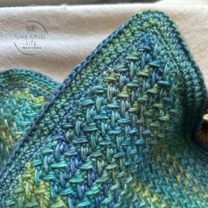 crochet blanket border in  shades of blue and green