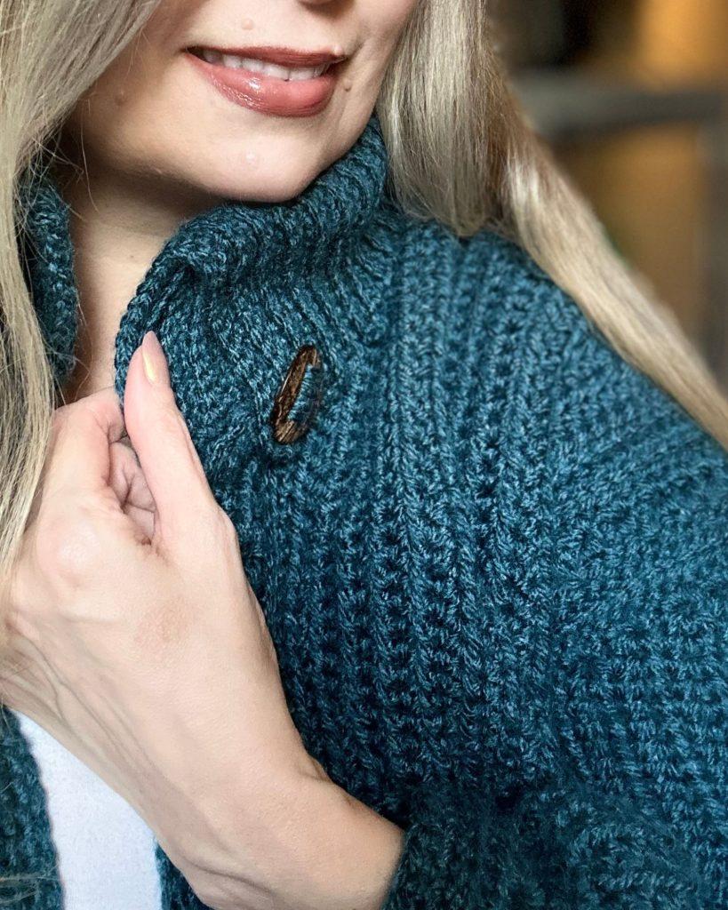 chunky crochet cardigan made with teal yarn