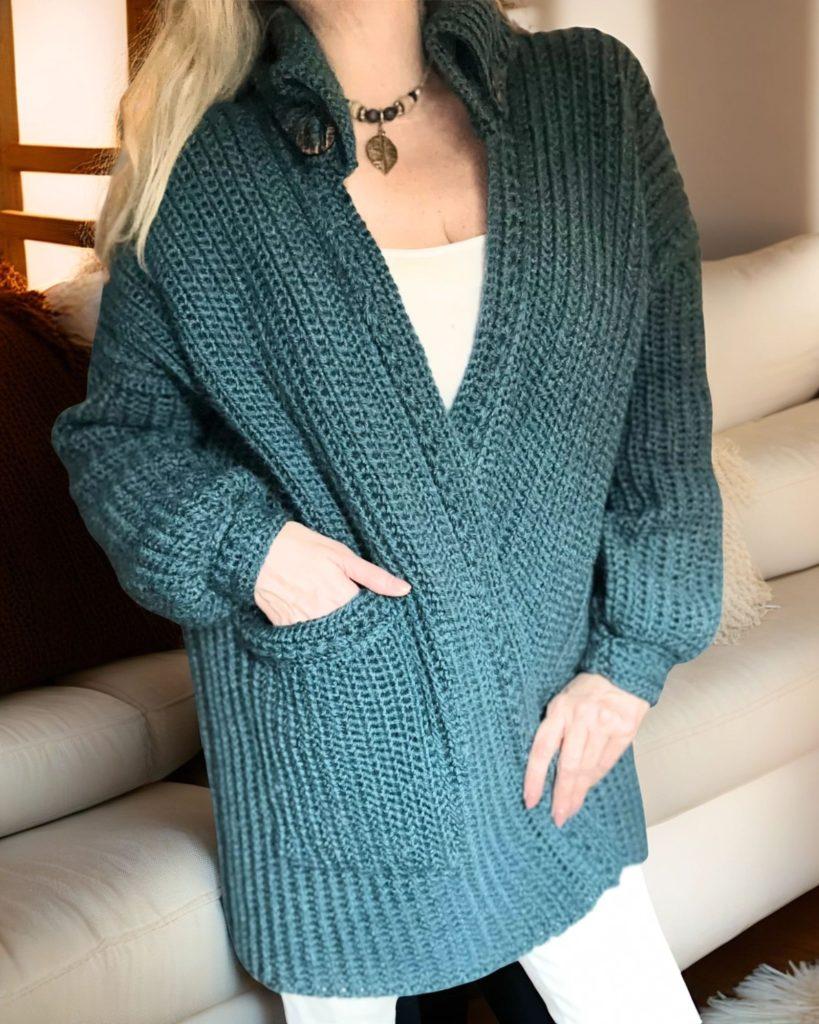 chunky yarn crochet oversized cardigan with collar made with teal blue yarn